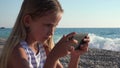 4K Girl Playing Tablet on Beach, Sunset View, Child Using Smart Phone, Seashore