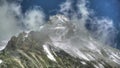 8K High Snowy Mountain Peak in Shape of a Symmetrical Pyramid