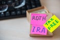 401k ira roth on pieces of colorful paper dollars on table. Pension concept. Retirement plans Royalty Free Stock Photo