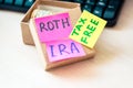 401k ira roth on pieces of colorful paper dollars on table. Pension concept. Retirement plans Royalty Free Stock Photo