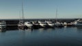 4 k Barcelona yacht club harbour view with the boats and ships parked in a peacefull calm zone for luxury owners