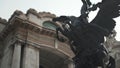 Bronze Pegasus Statue With the Bellas Artes Palace in the Background