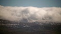 8K Mist Cloud Flowing Down Ridge of Mountain Range