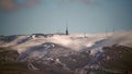 8K Mist Cloud Flowing Down Ridge of Mountain Range