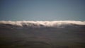 8K Mist Cloud Flowing Down Ridge of Mountain Range