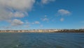 4k panning time lapse of Elie town and beach with sea in foreground