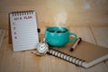 401 K plan list with pocket watch and cup Royalty Free Stock Photo