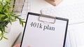 401K PLANNING text written on a paper with pen and glasses Royalty Free Stock Photo