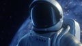 4K Portrait alone Astronaut looks at the orbit in outer space, the planet earth reflects shimmers with colorful lights in a spacem