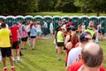 10K Runners Wait In Line To Use Portable Toilets