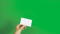 4K. set of woman hand showing blank white business name card paper in 3 different actions isolated on chroma key green screen