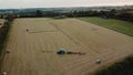 4k spinning around farmers baying hay in their field during summertime in England.