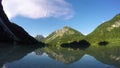 4K. Sunset at amazing alpen lake, time lapse with deep mooving shadows. Predil Lake (Lago Del Predil), alps mountains,