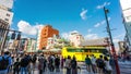 4K UHD time lapse of Asakusa sensoji gate, tourist crowd walking entrance to temple and car traffic transport across intersection.