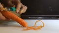 4K Video peeling a fresh carrott