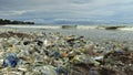 4K video of plastic garbage and other trash on sea beach. Ecological concept