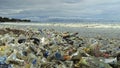 4K video of plastic garbage and other trash on sea beach. Ecological concept