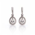 18k White Gold Hollow Halo Drop Earrings With Princess Cut Diamonds Royalty Free Stock Photo