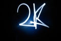 2K word sparkler on black background. by Small Lighting Royalty Free Stock Photo