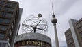 4K. The World Clock and the Television Tower at Alexanderplatz in Berlin