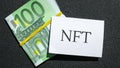4k zoom in out NFT non-fungible token text. Concept words NFT non-fungible token on paper blank. Background of euro