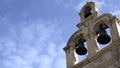 4K. Zoom in, three bells on church tower in Dubrovnik Old Town, Croatia
