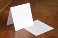 Standing blank empty square greeting card and envelope mock-up Royalty Free Stock Photo