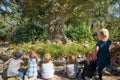 KAATSHEUVEL, NETHERLANDS - APRIL 19, 2019: An old tree tells children legends and fairy tales