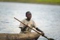 Children in a dugout canoe on Lake Bunyonyi