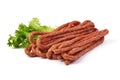 Kabanos. Polish long thin dry sausage made of pork. Isolated on white background Royalty Free Stock Photo