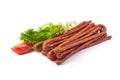 Kabanos. Polish long thin dry sausage made of pork. Isolated on white background Royalty Free Stock Photo