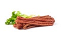 Kabanos. Polish long thin dry sausage made of pork. Isolated on white background Royalty Free Stock Photo