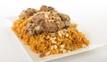 Kabsa with cooked meats in white background - Mandi Rice Kabsah with Meats - Mandi Meats