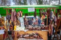 KACAREVO, SERBIA - FEBRUARY 18, 2024: Stand of a butcher in the Slaninijada Kacarevo market selling sausages, smoked and cured
