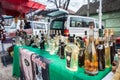 Arious bottles of rakija, of different fruits sizes and flavours, on display in a market in Kacarevo, Serbia