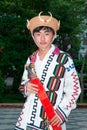 Kachin or Jingpo people in traditional clothes wear traditional wicker hats with wild boar tusks. Royalty Free Stock Photo