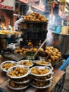 Kachori an Indian snack served with onion and green chatni and red chatani