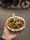 Kachori an Indian snack served with onion and green chatni and red chatani, banaras,india