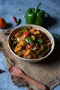 Kadai Paneer a semi dry curry made with Indian cottage cheese, onions tomatoes and green bell peppers. Royalty Free Stock Photo