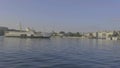 One of inland passenger ships of Istanbul Marmara Sea moving on sea to board and get people in ferry terminal in a bright summer