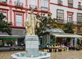 Kadiz street, Spain. Flowers market and monument