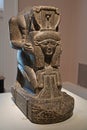 Kaemwaset Kneeling with an Emblem of Hathor, Egypt, ca. 1400-1390 BC Granite, pigment, Brooklyn Museum ,New York, USA Royalty Free Stock Photo