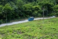 Kaeng Krachan Petchburi / Thailand - July 29 2018: The car is Driving down through the hills from San dam of Kaeng Krachan dam