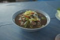 Kaeng Oom Neua or Northeastern Thai Clear Spicy Hot and Sour Soup with Beef mixed vegetables