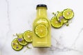 Kaffir juice in bottle herbal vegetation with slice for health care
