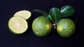 Kaffir Lime or Citrus hystrix. Some are whole, some have been sliced Royalty Free Stock Photo