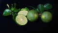 Kaffir Lime or Citrus hystrix. Some are whole, some have been sliced Royalty Free Stock Photo
