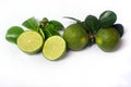 Kaffir Lime or Citrus hystrix. Some are whole, some have been sliced Royalty Free Stock Photo