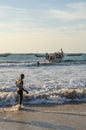 Kafountine, Senegal - November 26, 2013: Return of the fishermen in wooden boats at beach in Casamance
