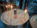 Burning candles at the Greek Orthodox Wedding Church, Kfar Kana, Israel Royalty Free Stock Photo